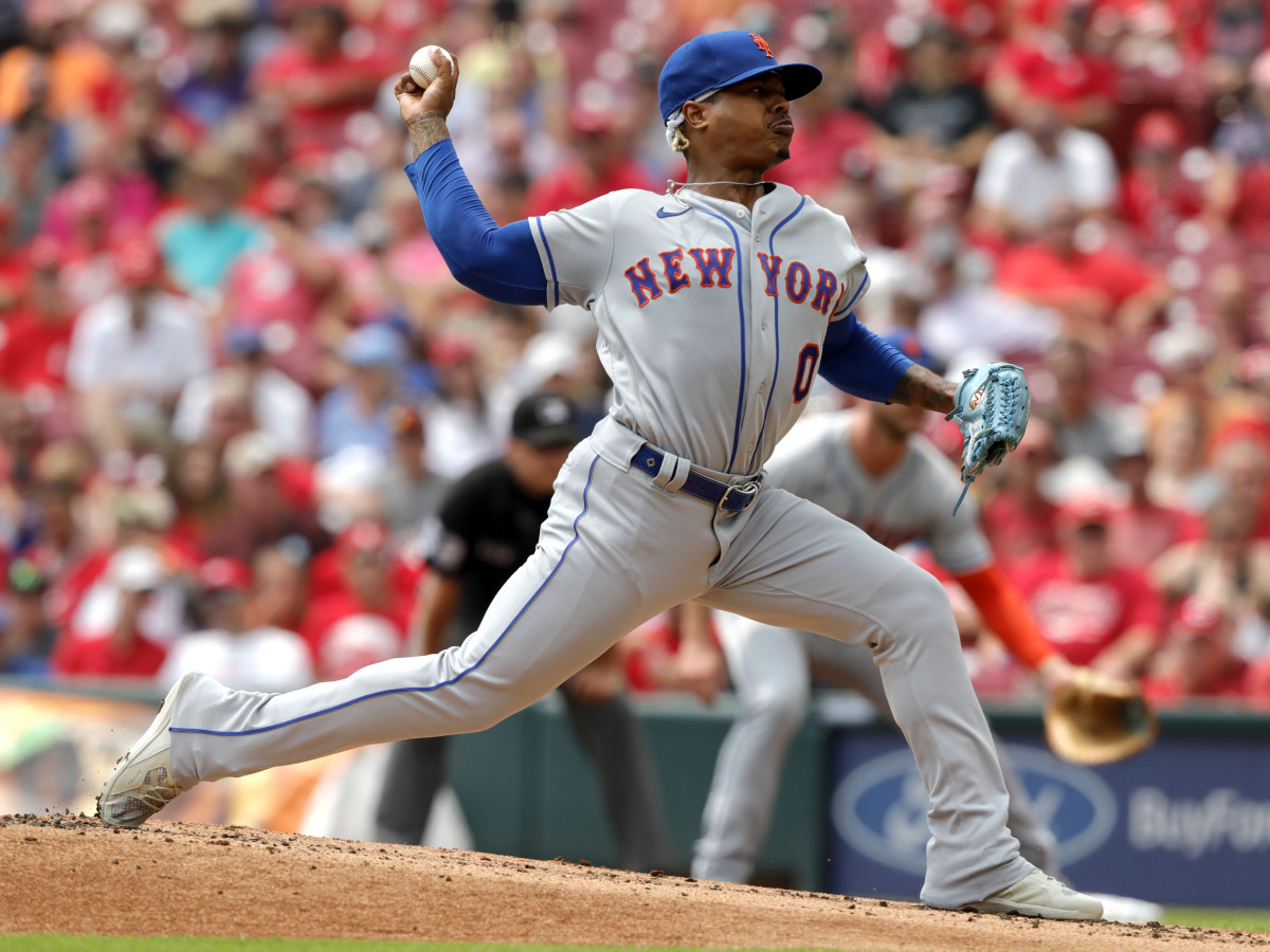 Jul 21, 2021; Cincinnati, Ohio, USA; New York Mets starting pitcher Marcus Stroman (0) throws a pitch against the Cincinnati Reds in the first inning at Great American Ball Park.